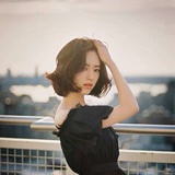 我见青山多妩媚