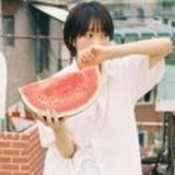 七七