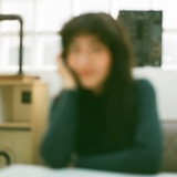 李